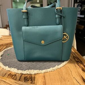 Michael Kors Blue Tote Bag with Gold Accents and Structured Design